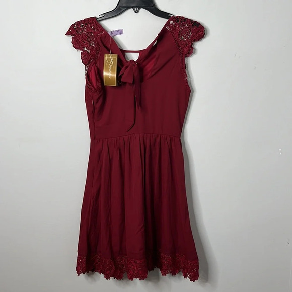 Francesca’s Burgundy Lace Sleeve Tie Back Dress NWT - Picture 7 of 7